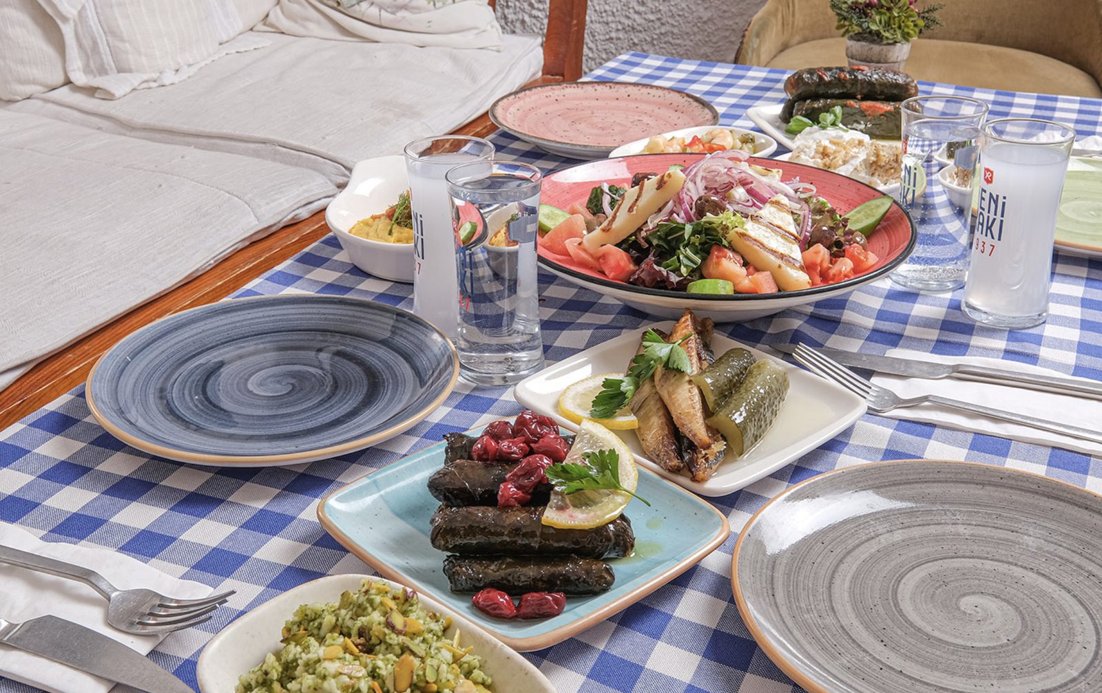 A harbor tavern in the Greek islands, a meze table